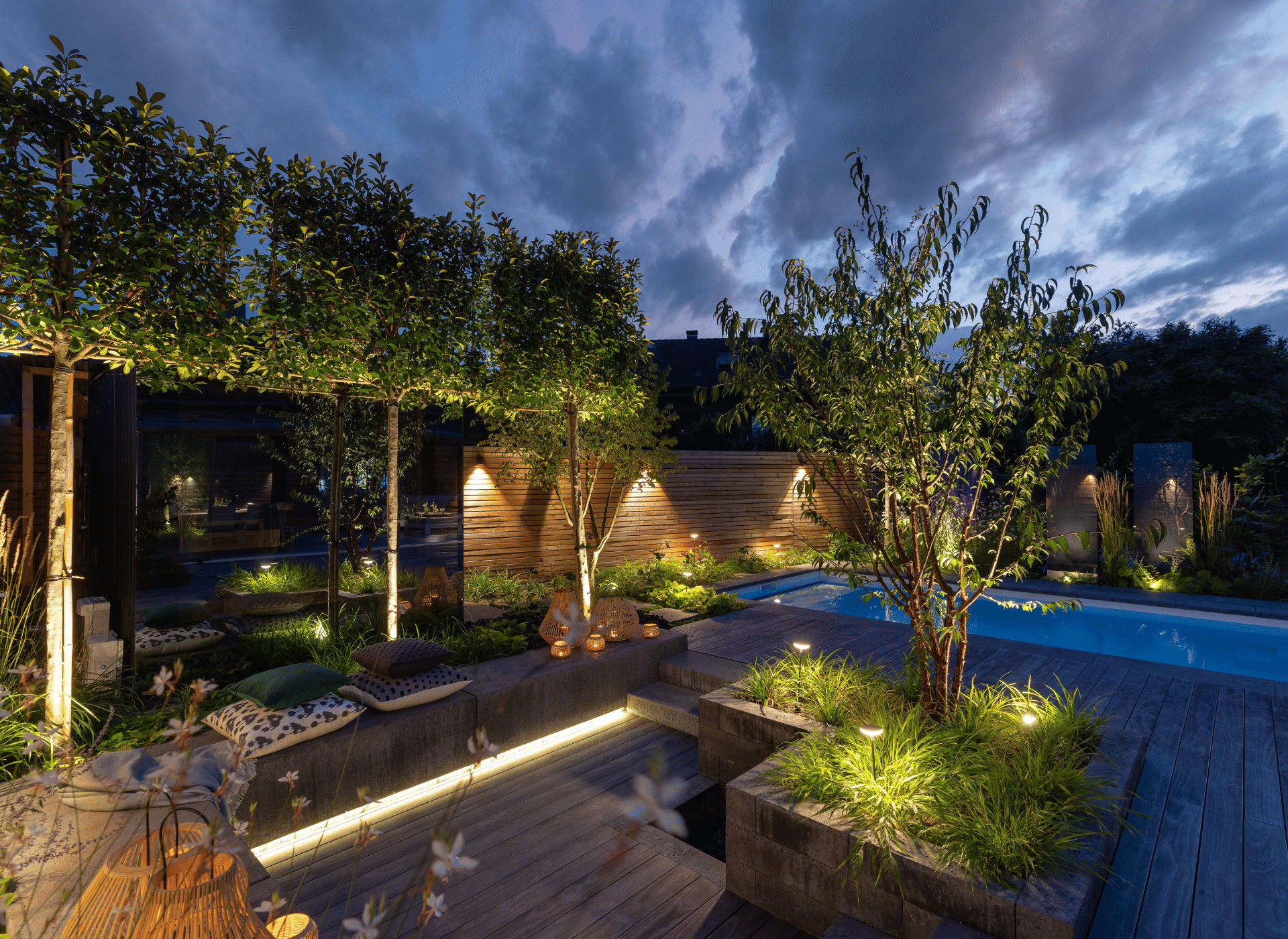 Grapids Irrigation landscape lighting installation at dusk